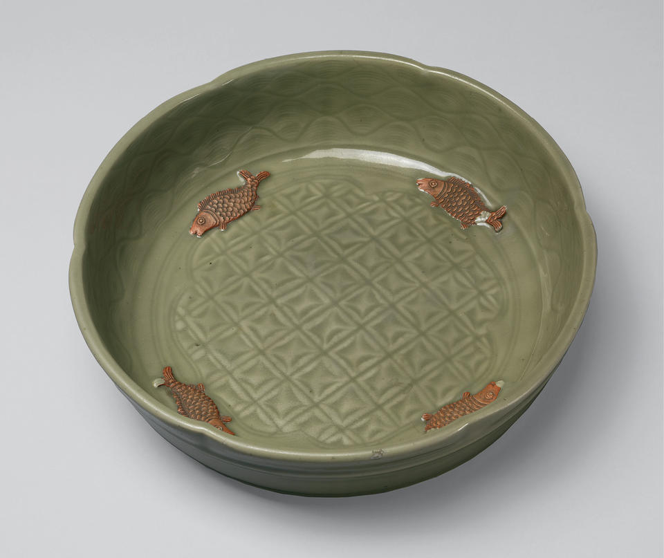 Basin with incised decoration and applied fish