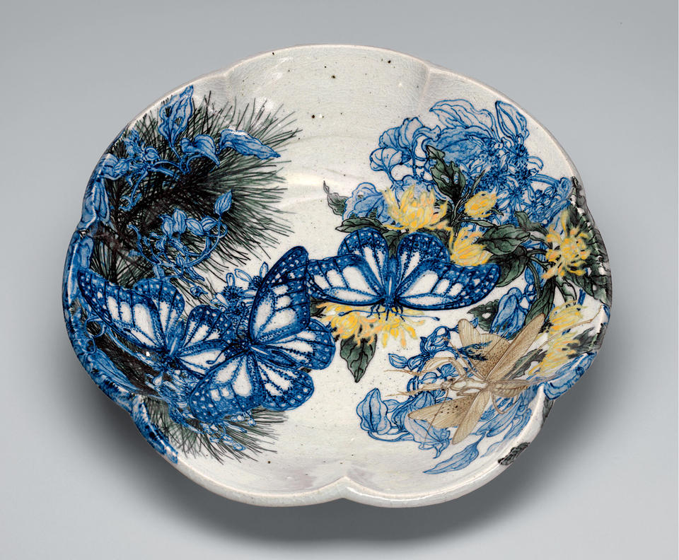 Bowl with butterflies, pine boughs, and flowers